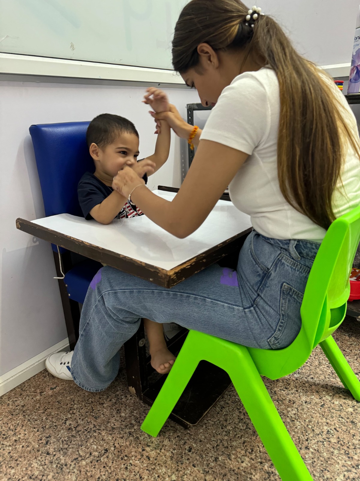 Child in ABA therapy session at our Delhi center